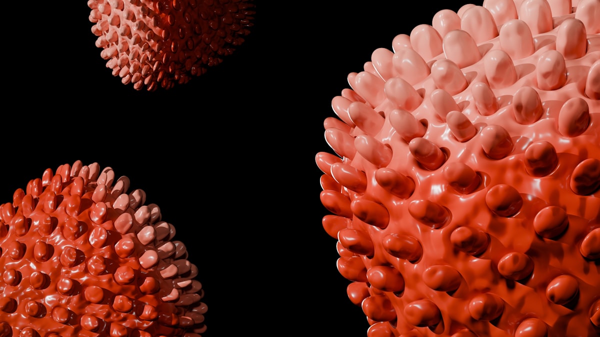 Three viruses floating against a black background.